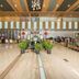 Kaisheng Xingfeng International Air Beijing lobby with polished floors, plants, and bell carts