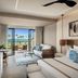 Secrets Tides Punta Cana suite in Uvero Alto with ocean-view balcony, king bed and seating area