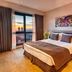 Fraser Place Antasya Istanbul bedroom with city view through floor-to-ceiling window
