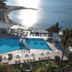 Sunrise Hotel in Pefki with beachfront pool terrace, sun loungers, and sea views