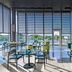 Al Zorah Beach Resort, Ajman: bright dining room with floor-to-ceiling windows and marina views