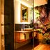 Flair Hotel Nieder bathroom with glass shower and nature mural in Bestwig