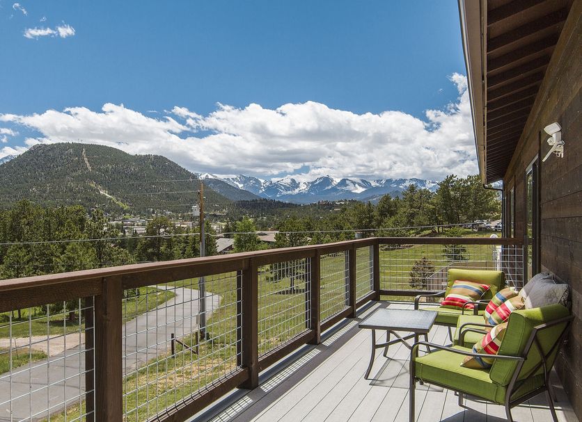 Coyote Mountain Lodge in Estes Park balcony with mountain and valley views