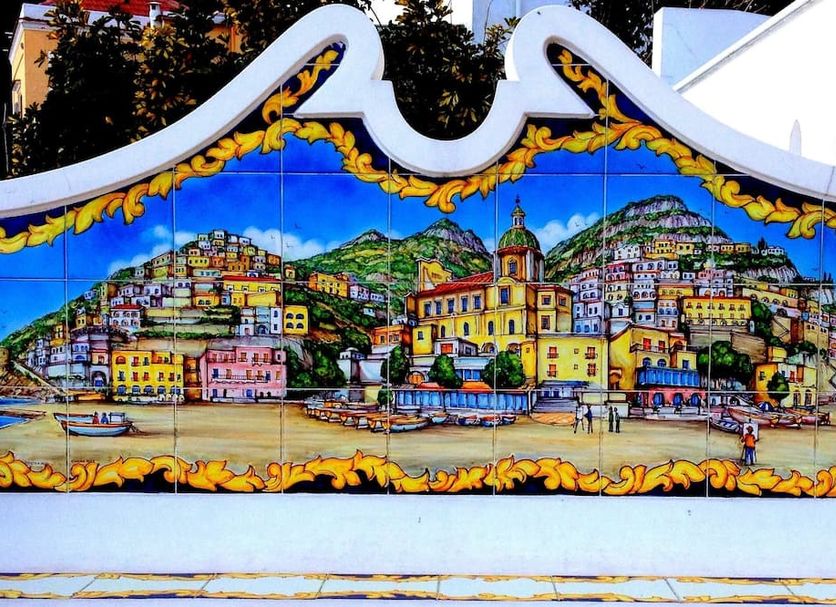 Palazzo Marzoli Resort in Positano with a colorful hand-painted mural of the seaside town