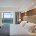 Windsor Marapendi in Rio de Janeiro, ocean-view guest room with balcony and king bed