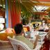 Colony Hotel & Cabana Club in Delray Beach lobby lounge with wicker seating and fireplace