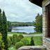 Hôtel Lac Carling Golf & Spa in Grenville with lake view, manicured gardens, and stone exterior