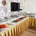 Talaslioglu Hotel Kayseri breakfast buffet with fruit, pastries, eggs and coffee on a gold-draped table