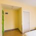 Hi Inn Beijing Shangdi Anningzhuang guest room with bed, green accent furniture and beige walls in Beijing