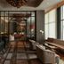 The Tess, Autograph Collection in Atlanta lobby lounge with seating, mirrored glass partition and chandeliers