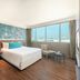 Centara Life Government Complex Hotel & Convention Centre Chaeng Watthana room with sea-themed wall and city view