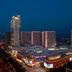 Sheraton Zibo Hotel in Zibo at night, with illuminated high-rise tower and cityscape views