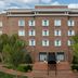 Homewood Suites by Hilton Huntsville-Village of Providence brick hotel exterior in Huntsville