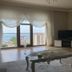 Nur Apart Marmaris living room with sea view, large windows, TV and sofa