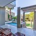 Lawhill Luxury Apartments in Cape Town with a covered patio, seating, and poolside view