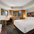 Best Western Northwoods Lodge in Siren: guest room with king bed, desk, window and lamps