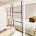 Majorelle Hostel Marrakech dorm room with bunk beds and white bedding