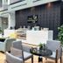 TIME Grand Plaza Hotel Dubai lobby lounge with colorful armchairs, coffee tables and a reception counter