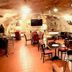 eXo Hotel Franka Bamberg - by NeVo Hotels in Hallstadt: cave-style restaurant with tables and chairs