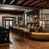 The Ritz-Carlton Orlando Grande Lakes bar and lounge with curved counter and high-top seating