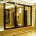 Chinflux Mandarin Hotel in Dongguan lobby with elevators and warm modern lighting