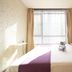 Jiayuan Express Hotel (Shenyang Railway Station Branch) guest room with double bed and window in Shenyang