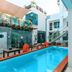 Casa Ticul Hotel By Bfh in Playa del Carmen with a courtyard pool and lounge seating