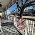 Quaker Inn in Ocean Grove: porch with red rocking chairs and street view