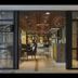 Hotel Grandhika Iskandarsyah Jakarta entrance to Eighty Five Lounge with modern seating