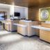 Fairfield Inn & Suites by Marriott Ottawa Airport lobby front desk with wood-paneled wall in Ottawa