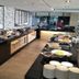 Ucsi Hotel Kuching in Kuching breakfast buffet with hot dishes, pastries and tableware