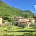 Agriturismo Cervano in Toscolano Maderno with hillside gardens and mountain views