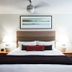 West Coast Suites At Ubc in Vancouver: bright guest room with king bed, bedside lamps, and framed wall art