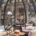 Les Manoirs de Tourgéville, Deauville: glass dome lounge with tufted sofas and floor lamp