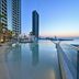 Onyx Rotana in Manama rooftop infinity pool overlooking the city and sea at sunset