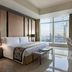 The Residences at The Ritz-Carlton Jakarta, Pacific Place room with city view, bed, desk and chair