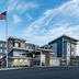 Residence Inn by Marriott Wilkes-Barre Arena exterior with American flag and modern hotel facade in Wilkes-Barre