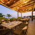 Fiesta Americana Cozumel outdoor terrace dining with ocean view at dusk