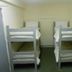 Lahinch Hostel in Lahinch twin bunk beds in a simple dorm room