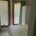 Self Contained Rooms in Central Torquay bedroom with bed, wardrobe and window blinds in Torquay