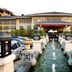 New Century Grand Hotel Kaifeng in Kaifeng, exterior with canal-style fountain and grand entrance