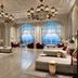 Hilton Salwa Beach Resort & Villas in Doha lounge with chandeliers and ocean-view arched windows
