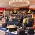 Reverb by Hard Rock Downtown Atlanta lobby lounge in Atlanta with neon sign, bar, and modern seating