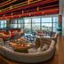 W Sydney rooftop lounge with curved banquettes and city views in Sydney