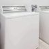 Hotel Piney Woods Huntsville laundry room with washer and dryer