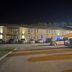 Days Inn by Wyndham Boonville exterior at night with parked cars and lit entrance