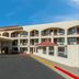 Red Roof Inn Albuquerque - Midtown exterior with covered entrance and arched balconies in Albuquerque