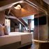Hôtel Saint-Delis - La Maison du Peintre - Relais & Châteaux in Honfleur, attic bedroom with sloped beams