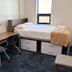 Humber College Lakeshore Residence room with single bed, desk, chair, and window in Toronto