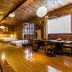 Home++ Xi'an in Xi'an: wood-paneled hotel room with beds, dining table, and bright window